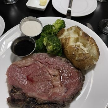 AJ's Steakhouse - I forgot to take a picture of the salad, but this was the prime rib, vegetable baked potato oh, and it came with a basket of bread. - Steakhouses Near Me - Altoona, Iowa AJ's Steakhouse - I forgot to take a picture of the salad, but this was the prime rib, vegetable baked potato oh, and it came with a basket of bread. - Steakhouses Near Me - Altoona, Iowa