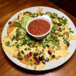 Progression Brewing Company - "Nachos" (corn tortilla chips topped w/ black beans, jalapeños, cheddar cheese, salsa, sour cream, guacamole, cilantro, green onion)