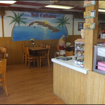Sol Cubano - A "walk-in" view of the main dining room, with the large "Sol Cubano" painting that dominates the room. - Cuban Near Me - North Highlands, California Sol Cubano - A "walk-in" view of the main dining room, with the large "Sol Cubano" painting that dominates the room. - Cuban Near Me - North Highlands, California