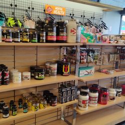 Chazzy Couples Boutique - Fully stocked physical health section including workout supplements, vitamins, and other wellness products.