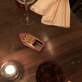 NaKorn - The cute little boat in which our check arrived at the end of our marvelous meal - Thai Near Me - Evanston, Illinois