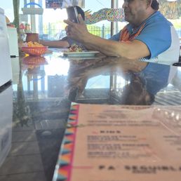 Playing his German Polka Banda on blast from his phone. Mohow Playing his German Polka Banda on blast from his phone. Mohow