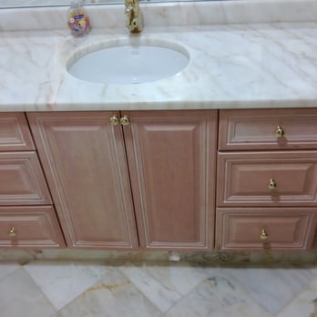 Arch-Craft Design & Construction - a bathroom vanity with marble countertop - General Contractors Near Me - Alexandria, Virginia Arch-Craft Design & Construction - a bathroom vanity with marble countertop - General Contractors Near Me - Alexandria, Virginia
