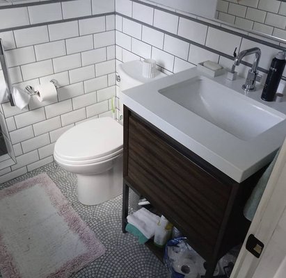 Bathroom remodel - This bathroom had a great update in Snoqualmie! Totally gutted, then added a walk in shower, subway tile with wainscoting, new floors and upgraded vanity.