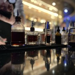 GEO-82 - Bitters are displayed in beautiful bottles.