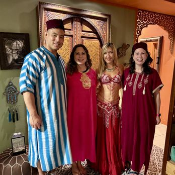 Le Bazaar - Group photo with bellydancer - Moroccan Near Me - Kihei, Hawaii