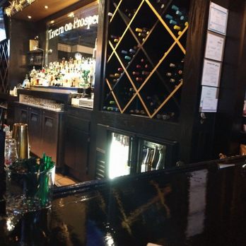 Tavern On Prospect - a bar with a wine rack - Bars Near Me - Peoria, Illinois Tavern On Prospect - a bar with a wine rack - Bars Near Me - Peoria, Illinois