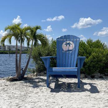Sunset Beach Club - a blue chair on the beach - Bars Near Me - Punta Gorda, Florida Sunset Beach Club - a blue chair on the beach - Bars Near Me - Punta Gorda, Florida