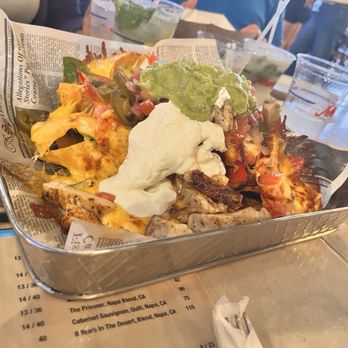 Monty's Sunset - South Beach - Nachos: Cheese, black beans, guacamole, onions, jalapeño, pico de gallo, and sour cream * - Seafood Near Me - Miami Beach, Florida