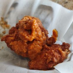 Curry Pizza - Half of our Tikka masala wings. Forgot to take a picture before digging in.