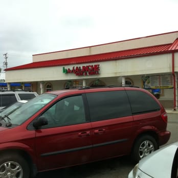 Las Adelitas - a red minivan in a parking lot - Mexican Near Me - Wauconda, Illinois Las Adelitas - a red minivan in a parking lot - Mexican Near Me - Wauconda, Illinois