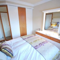 Langley Interiors - White and oak fitted bedroom