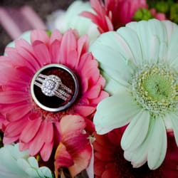 Rogers & Hollands Jewelers - Our wedding day: ladies halo engagement ring with an insert style band and mens tungsten carbide band with a ceramic inlay