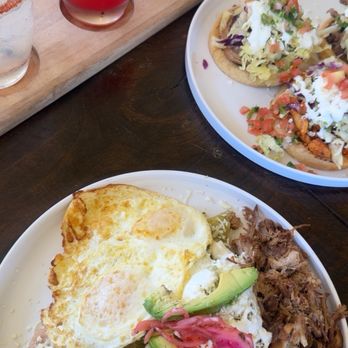 Palapas Que Huevos - Chilaquiles with green crema sauce, trio sopes & flight of margaritas - Breakfast & Brunch Near Me - Fullerton, California Palapas Que Huevos - Chilaquiles with green crema sauce, trio sopes & flight of margaritas - Breakfast & Brunch Near Me - Fullerton, California