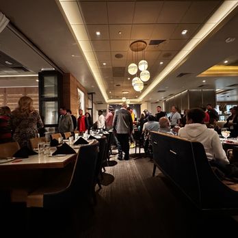 Fogo de Chão - a crowded dining room - Brazilian Near Me - Albuquerque, New Mexico