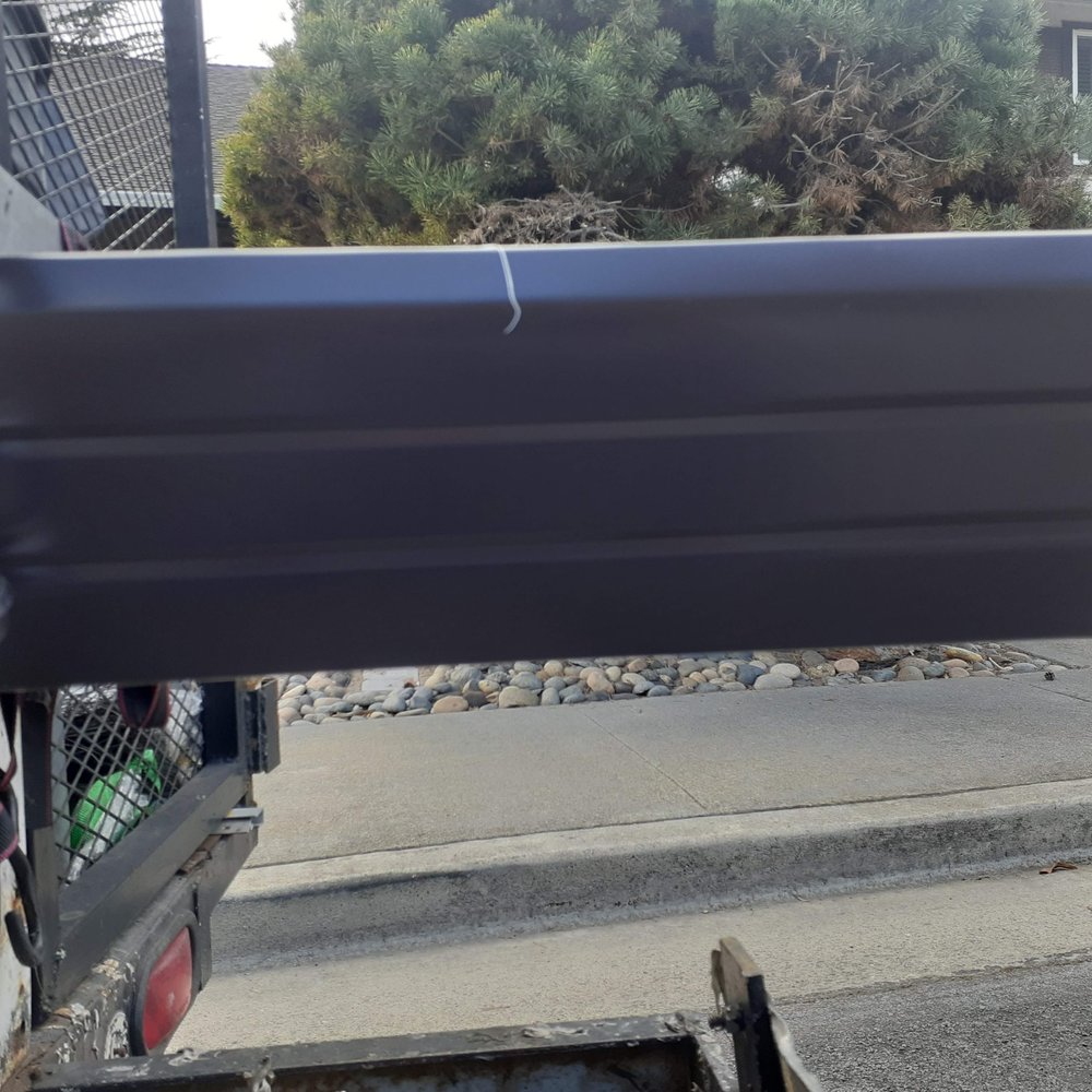 Slide of JB Rain Gutter installation