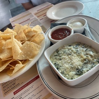 Waterfront Grill - Spinach Artichoke Dip! With fresh Chips & Salsa! Salsa is chunky & super yum, same with the spin dip! - Sushi Bars Near Me - Jenks, Oklahoma Waterfront Grill - Spinach Artichoke Dip! With fresh Chips & Salsa! Salsa is chunky & super yum, same with the spin dip! - Sushi Bars Near Me - Jenks, Oklahoma
