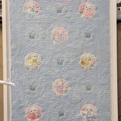 Davis Studio - Framing of a vintage baby quilt.