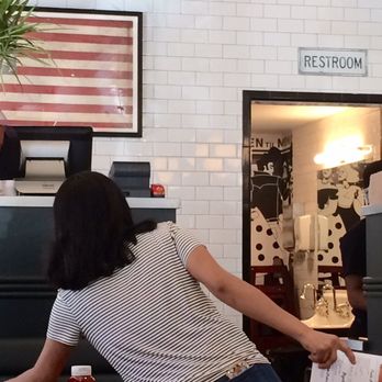 Green Kitchen - The hostess and bathroom in background. 03/20/19 - Diners Near Me - New York, New York Green Kitchen - The hostess and bathroom in background. 03/20/19 - Diners Near Me - New York, New York
