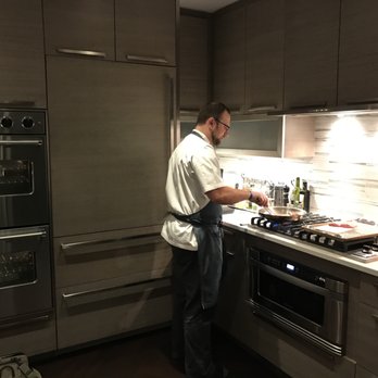 dineDK Private Dining - David hard at work preparing the lamb - Personal Chefs Near Me dineDK Private Dining - David hard at work preparing the lamb - Personal Chefs Near Me