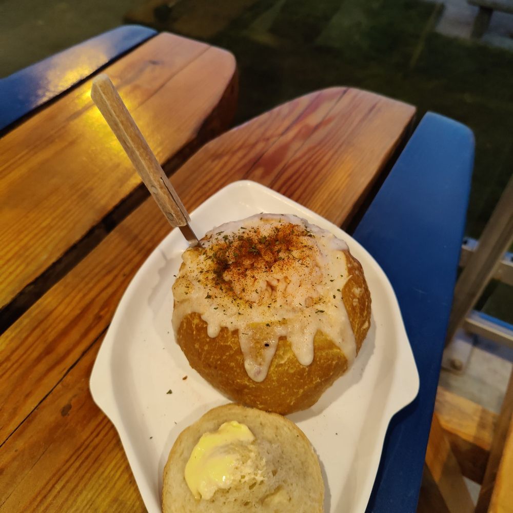 Best Western Plus Ocean View Resort - Chowder in a bread bowl topped with shrimp. Great price!! Lots of shrimp! So delicious! - Hotels Near Me - Seaside, Oregon
