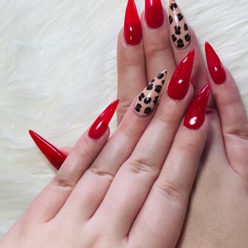 Julie's Nails & Spa - Stilleto shaped candy apple red with a cheetah accent nail! - Nail Salons Near Me - Vancouver, Washington Julie's Nails & Spa - Stilleto shaped candy apple red with a cheetah accent nail! - Nail Salons Near Me - Vancouver, Washington