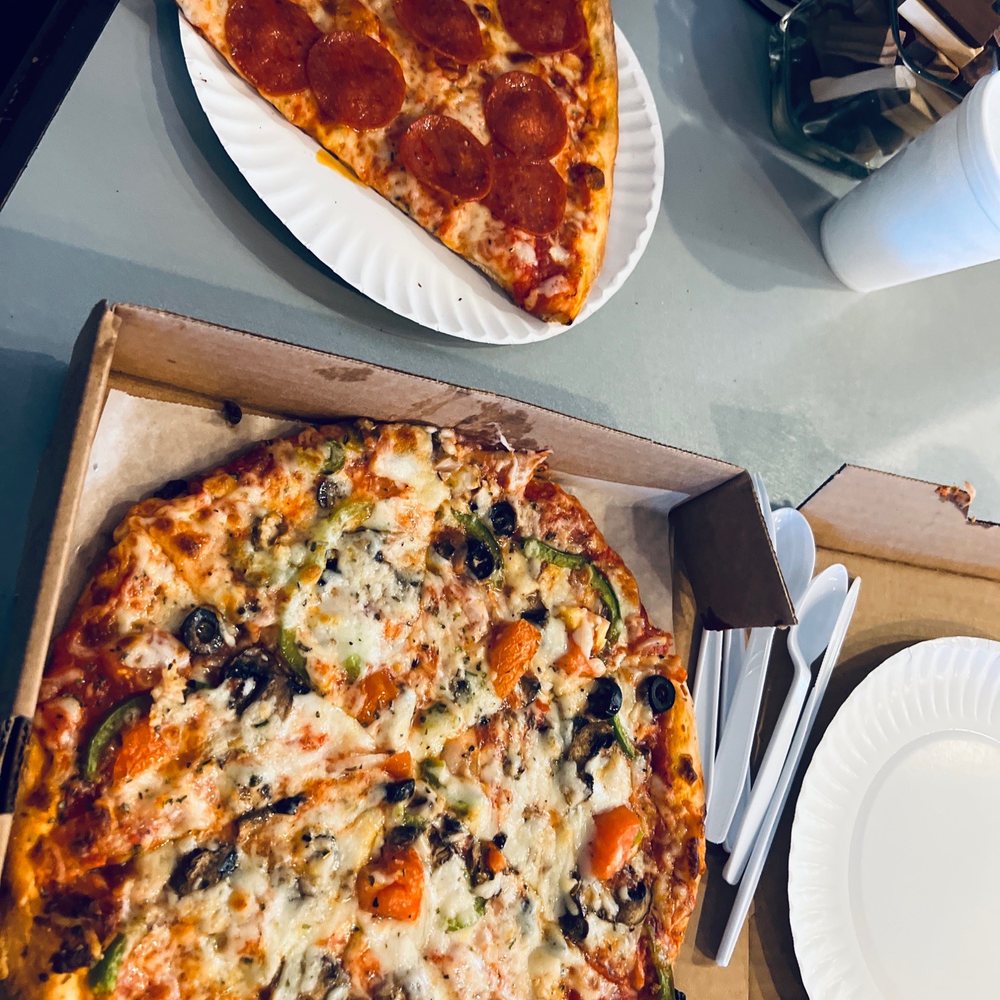 We are staying at Ponte Vedra Inn & Club and wanted pizza! This pizza was so delicious! They sell by the slice or a whole pizza.