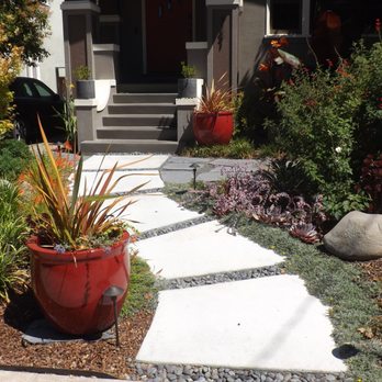 Reppard's Landscaping - Concrete walkway with curve groundcover and plants - Landscaping Near Me Reppard's Landscaping - Concrete walkway with curve groundcover and plants - Landscaping Near Me