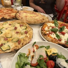 Salad, pizzas: zucchini/sasuage, margarita, prosciutto, mozzarella cheese