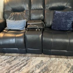 Rooms To Go - Loveseat #2. Comparison between seat that we use regularly and one that we do not.