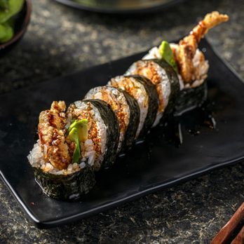 Toro Sushi - a plate of sushi and chopsticks - Sushi Bars Near Me - Chicago, Illinois