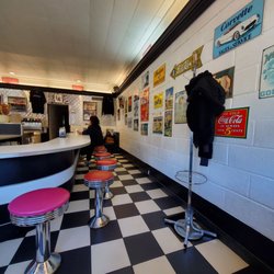 Red Knapp's Dairy Bar - Last time I was here I sat at the counter on the cool seats. Wall decor tells many stories back in time. 11/1/2022