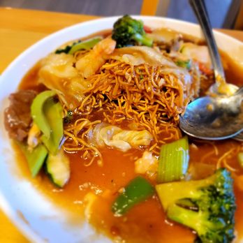 W Cafe - House pan fried noodle. Noodles start off crispy then soft as the gravy absorbs. Good flavor, but also skimpy on the shrimp and beef. - Chinese Near Me - Eastvale, California W Cafe - House pan fried noodle. Noodles start off crispy then soft as the gravy absorbs. Good flavor, but also skimpy on the shrimp and beef. - Chinese Near Me - Eastvale, California
