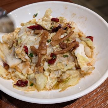 Picky Hunan - Cabbage with crispy pork bits, half eaten so you can see the generous amount of pork bits - Pan Asian Near Me - Alhambra, California Picky Hunan - Cabbage with crispy pork bits, half eaten so you can see the generous amount of pork bits - Pan Asian Near Me - Alhambra, California