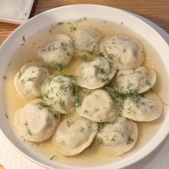 Alyonka Russian Cuisine - Pelmeni - Russian-style dumplings, ground beef filling, sour cream and garnished fresh dill. $28.95 (also available soup form + $3.00) - Russian Near Me - Boise, Idaho Alyonka Russian Cuisine - Pelmeni - Russian-style dumplings, ground beef filling, sour cream and garnished fresh dill. $28.95 (also available soup form + $3.00) - Russian Near Me - Boise, Idaho