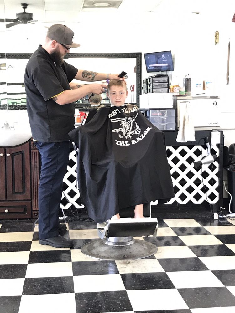 The Baron Barbershop  Logo