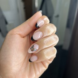 Bellamy Nails - Classic black French tip with a cute little butterfly