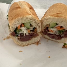 BBQ Pork Banh Mi $7.50 (price as of March 2026) BBQ Pork Banh Mi $7.50 (price as of March 2026)