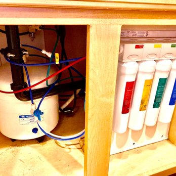 Fixa Ranch - Water damage board under kitchen sink with RO system - Handyman Near Me - San Diego, California