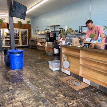 The Good Water & Coffee - a woman at the counter - Water Stores Near Me - Gardena, California The Good Water & Coffee - a woman at the counter - Water Stores Near Me - Gardena, California