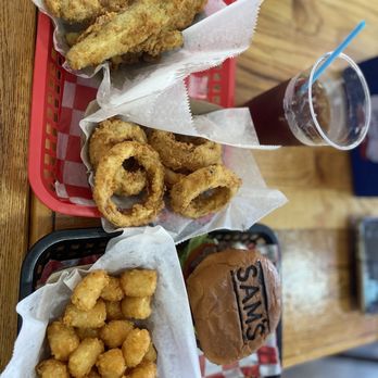 Sam's Burger Joint - Bacon burger, fried pickles, onion rings, tater tots and delicious sweet tea. - Music Venues Near Me - San Antonio, Texas Sam's Burger Joint - Bacon burger, fried pickles, onion rings, tater tots and delicious sweet tea. - Music Venues Near Me - San Antonio, Texas