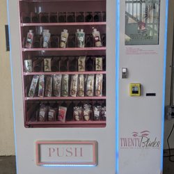 Bridge Street Town Centre - All things eyelashes vending machine in parking outside of Belk 1st floor.