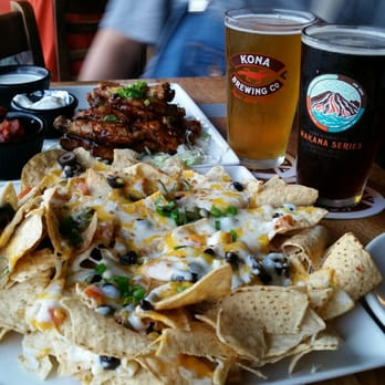 Kona Brewing - Chicken wings with ranch and nachos with sour cream and salsa. Along with two select beers straight from the tap. - Pubs Near Me - Honolulu, Hawaii Kona Brewing - Chicken wings with ranch and nachos with sour cream and salsa. Along with two select beers straight from the tap. - Pubs Near Me - Honolulu, Hawaii