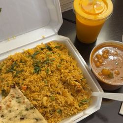India Palace - Got the vegetable biryani, channa masala (spicy), garlic naan, mango lassi, also came with basmati rice.