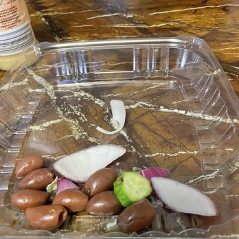 Larry's Steaks - Olives, mini cucumber with a spot on it and chunks of onions - Cheesesteaks Near Me - Philadelphia, Pennsylvania Larry's Steaks - Olives, mini cucumber with a spot on it and chunks of onions - Cheesesteaks Near Me - Philadelphia, Pennsylvania