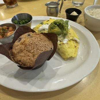 Wild Eggs - Omelette served with a fresh baked blueberry muffin and grits- among other choices too! The grits were probably some of the best I've had. - Breakfast & Brunch Near Me - Louisville, Kentucky