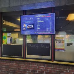 Lady Nays Caribbean and Soul - You can see the order window on the left. I saw a handwritten sign saying ribs, so apparently, there can be off the menu items