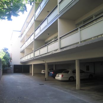 Safe Engineering Construction - A Soft Story Earthquake Hazard Condition of an Apartment Building over Garages with open front. - General Contractors Near Me