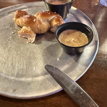 The Lokal Mustang - Pretzel Appetizer (1/2 eaten ) - New American Near Me - Mustang, Oklahoma The Lokal Mustang - Pretzel Appetizer (1/2 eaten ) - New American Near Me - Mustang, Oklahoma