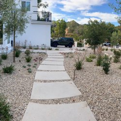 D L R Construction - Clean, modern curb appeal! Removed lawn and added a fresh new walkway and driveway--sleek design, low maintenance, and beautifully done!